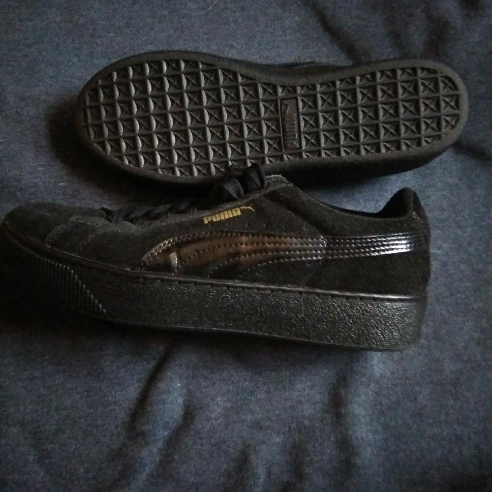 Brand new black pumas